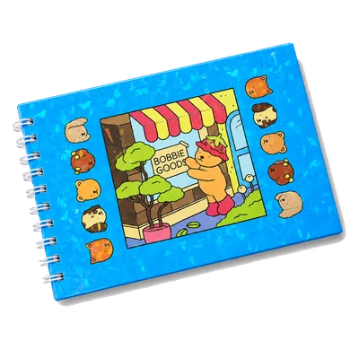 Caderno de colorir espiral, capa azul combinando com o livrinho